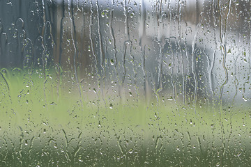 Image showing Window to a garden on a rainy day