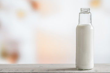 Image showing Bottle of milk on a table