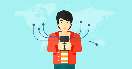 Image showing Man using smartphone.