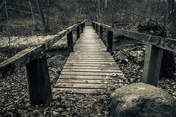 Image showing Old wooden bridge with planks