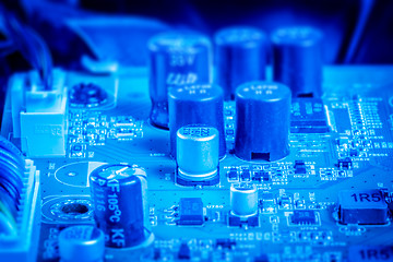 Image showing Power capacitors and chips in blue color