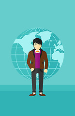 Image showing Businessman standing on globe background.