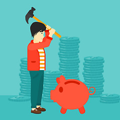 Image showing Man breaking piggy bank.