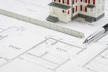 Image showing Model Home, Engineer Pencil and Ruler Resting On House Plans