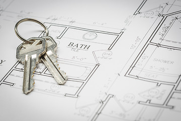 Image showing Set Of New House Keys Resting On House Plans