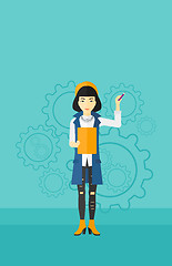 Image showing Woman standing on gears background.