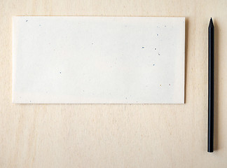 Image showing Letter envelope with pencil