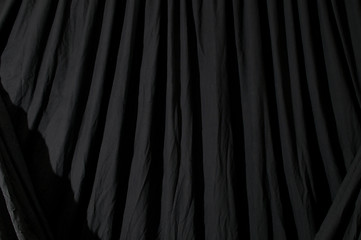 Image showing Draped black backdrop cloth 