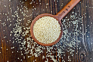 Image showing Sesame seeds in ladle on board top