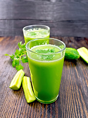 Image showing Juice cucumber with parsley in two glass on board