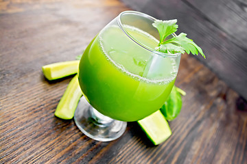 Image showing Juice cucumber in wineglass on board