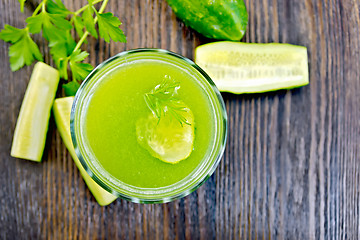 Image showing Juice cucumber in glassful on board top