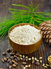 Image showing Flour cedar in wooden bowl on board