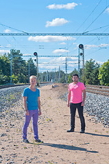 Image showing Two handsome young guys jumping