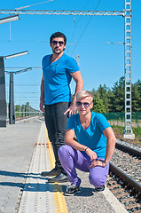 Image showing Two young men standing on the platform