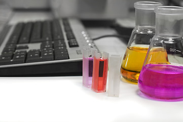 Image showing lab flasks and computer keyboard