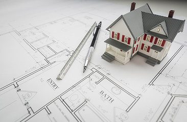 Image showing Model Home, Engineer Pencil and Ruler Resting On House Plans