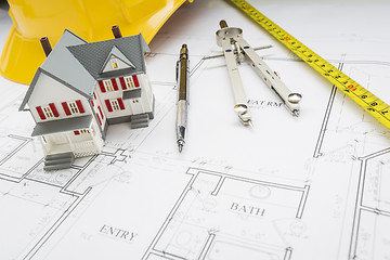 Image showing Home, Measuring Tape, Hard Hat, Pencil, Compass on House Plans