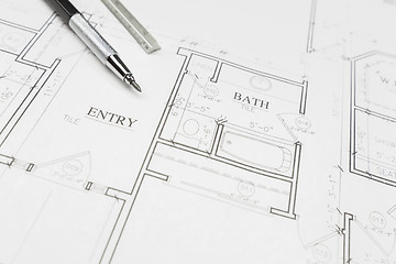 Image showing Engineer Pencil and Ruler Resting on House Plans