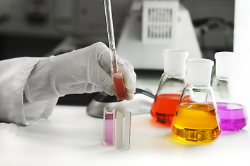 Image showing hand with glove pipetting