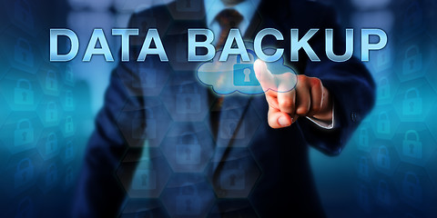 Image showing Corporate Computer User Touching DATA BACKUP