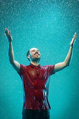 Image showing The portrait of young man in the rain