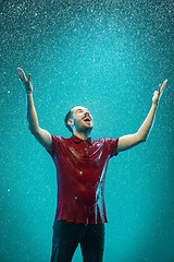 Image showing The portrait of young man in the rain