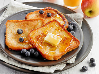 Image showing French toast with butter and honey