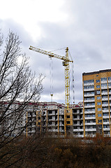 Image showing Pieces of Metal and Stone are Crumbling from Demolished Building