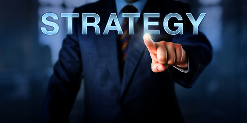 Image showing Business Manager Touching STRATEGY