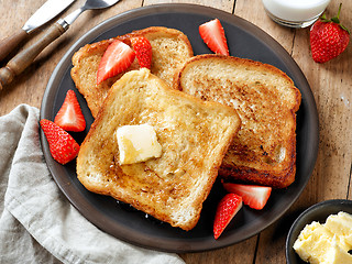 Image showing French toast with butter and honey