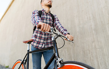Image showing hipster man with fixed gear bike and backpack
