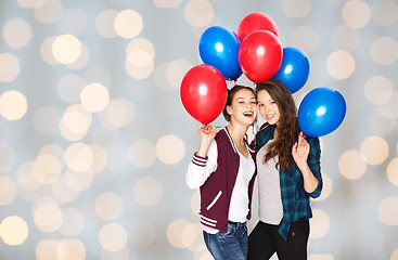 Image showing happy teenage girls with helium balloons