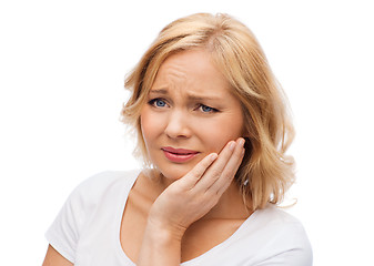 Image showing unhappy woman suffering toothache