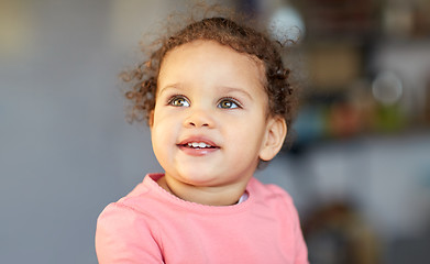 Image showing beautiful little mulatto baby girl face