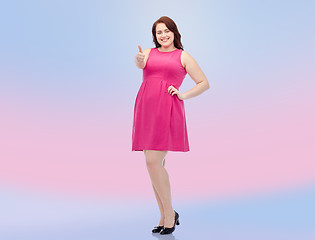 Image showing happy young plus size woman showing thumbs up