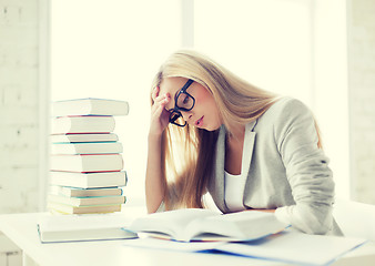 Image showing student with books and notes