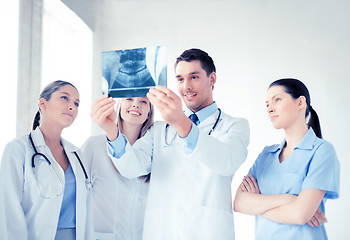 Image showing young group of doctors looking at x-ray