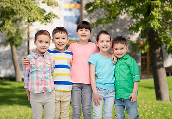 Image showing happy smiling little children hugging