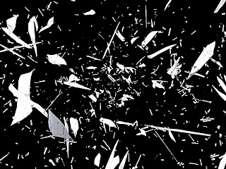 Image showing Shattered or splitted glass Pieces isolated on black