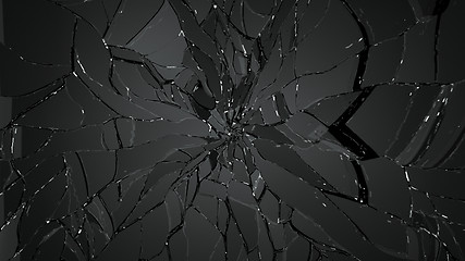 Image showing Splitted or cracked glass on black