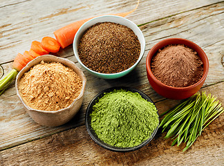 Image showing bowls of various dried plant powders