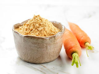 Image showing bowl of dried carrot powder