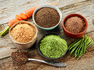 Image showing bowls of various dried plant powders