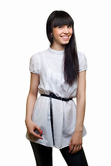 Image showing Friendly smiling young woman portrait studio shot