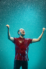 Image showing The portrait of young man in the rain