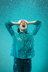 Image showing The portrait of young beautiful woman in the rain