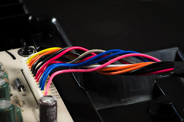 Image showing Colorful wires on a motherboard