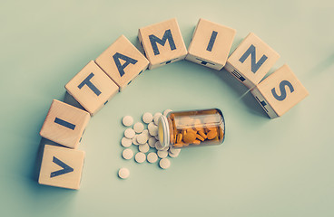 Image showing The word vitamins on a table