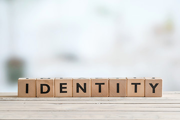 Image showing Identity sign on wooden table